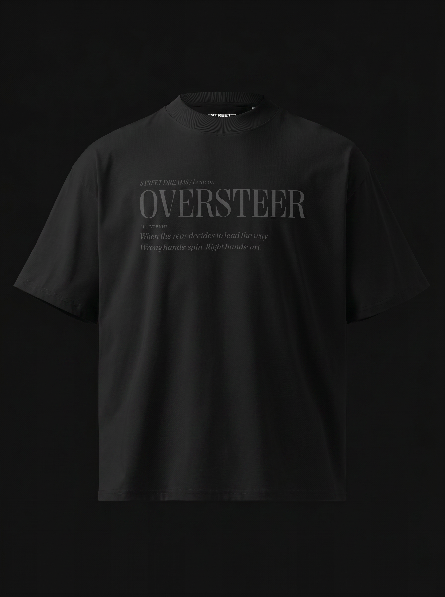 Black t-shirt with 'OVERSTEER' text on a black background